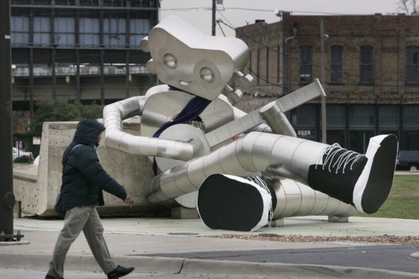 In December, "The Traveling Man-Waiting on a Train" sculpture at Gaston and Good Latimer got...