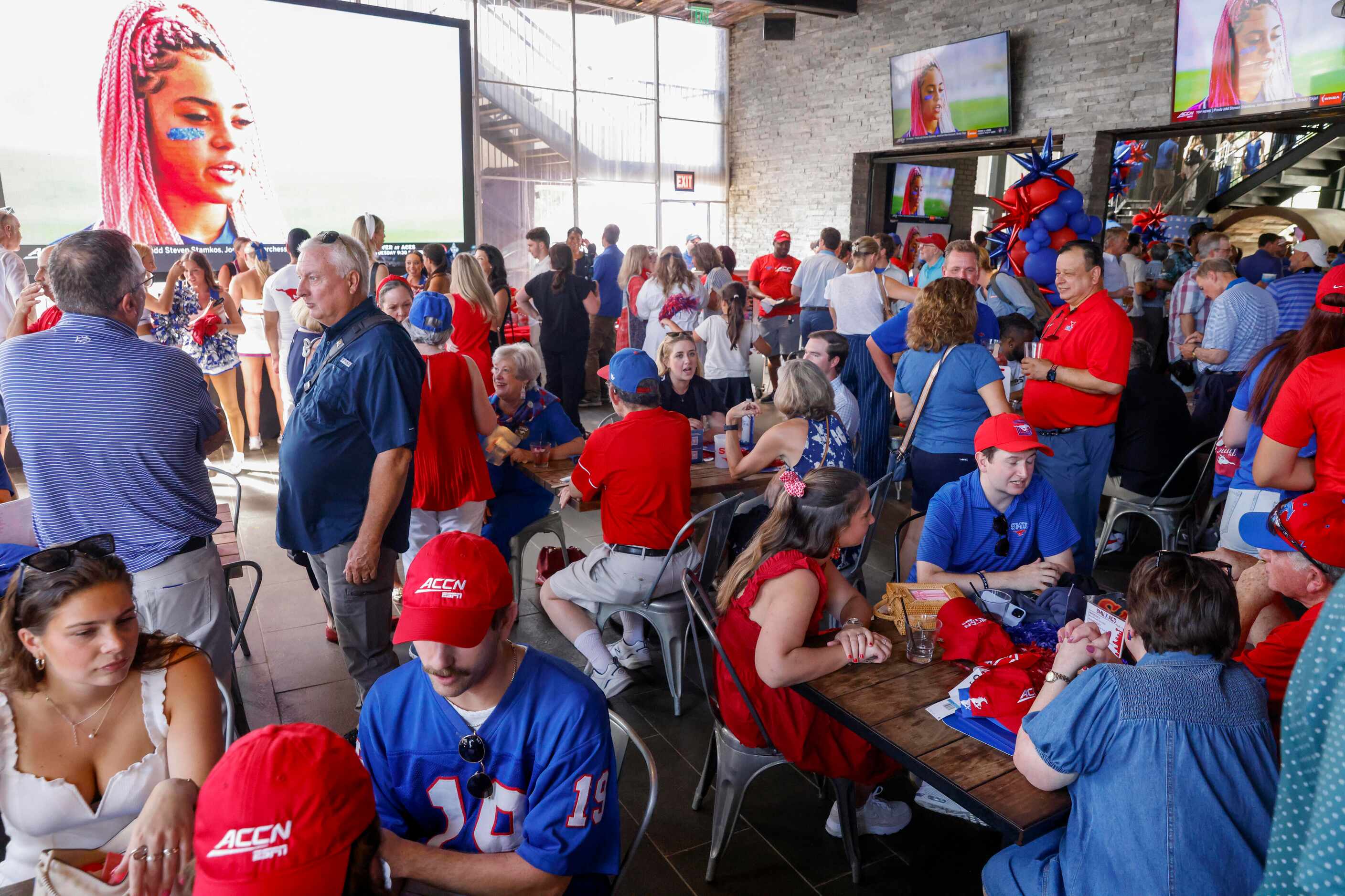 SMU alumni and supporters gather during a celebration of SMU’s first day in the ACC at...