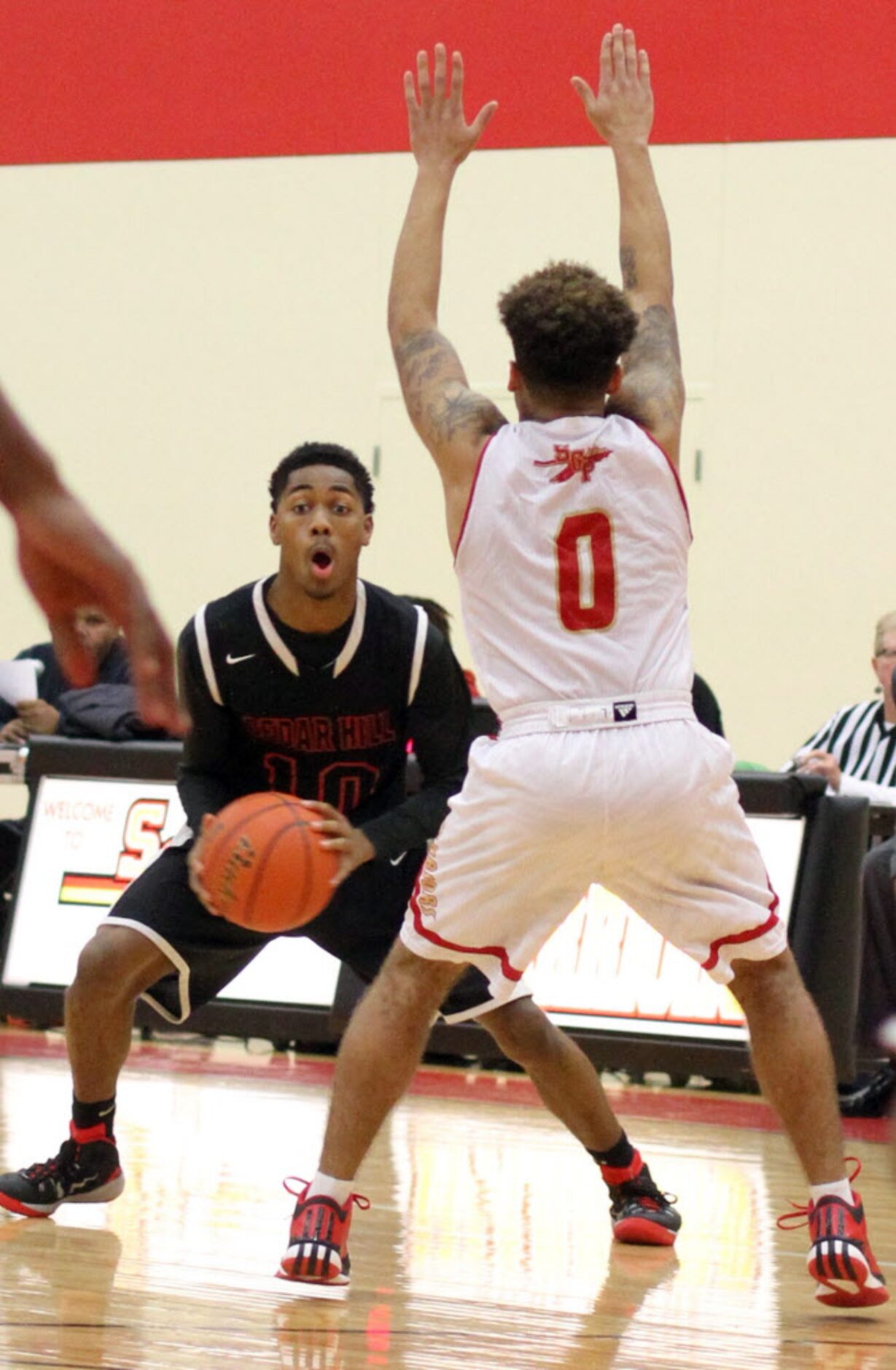 Cedar Hill guard Russhard Cruickshank (10) looks for an open teammate as South Grand Prairie...