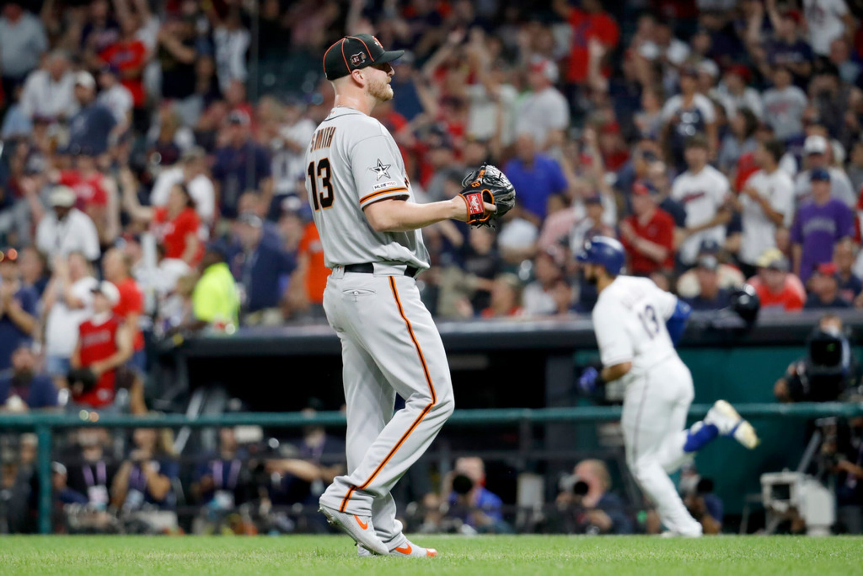 National League Will Smith, of the San Francisco Giants, waits for a new baseball after...