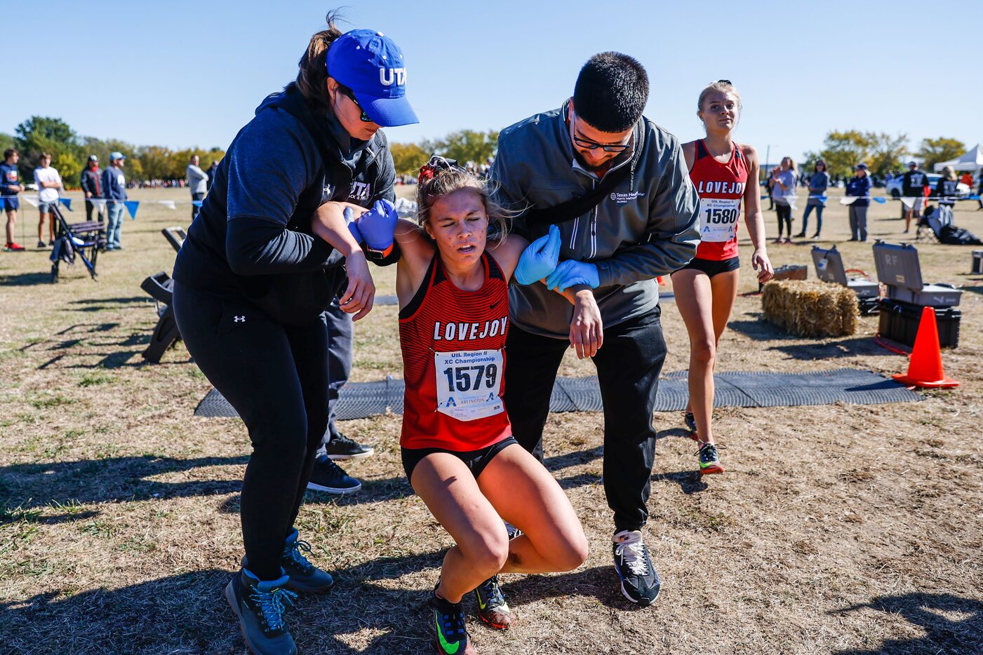 Amy Morefield (1579) from Lucas Lovejoy team collapses after crossed the finish line first...