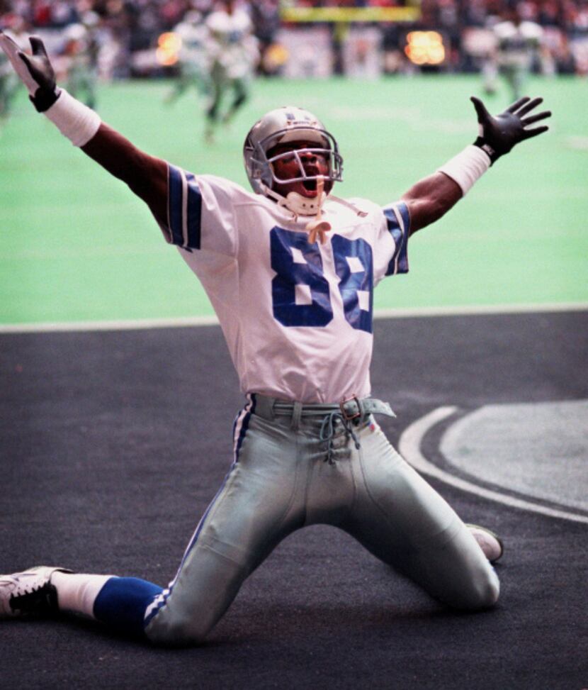 Nov. 23, 1995: Michael Irvin celebrates in the end zone after making a touchdown catch...