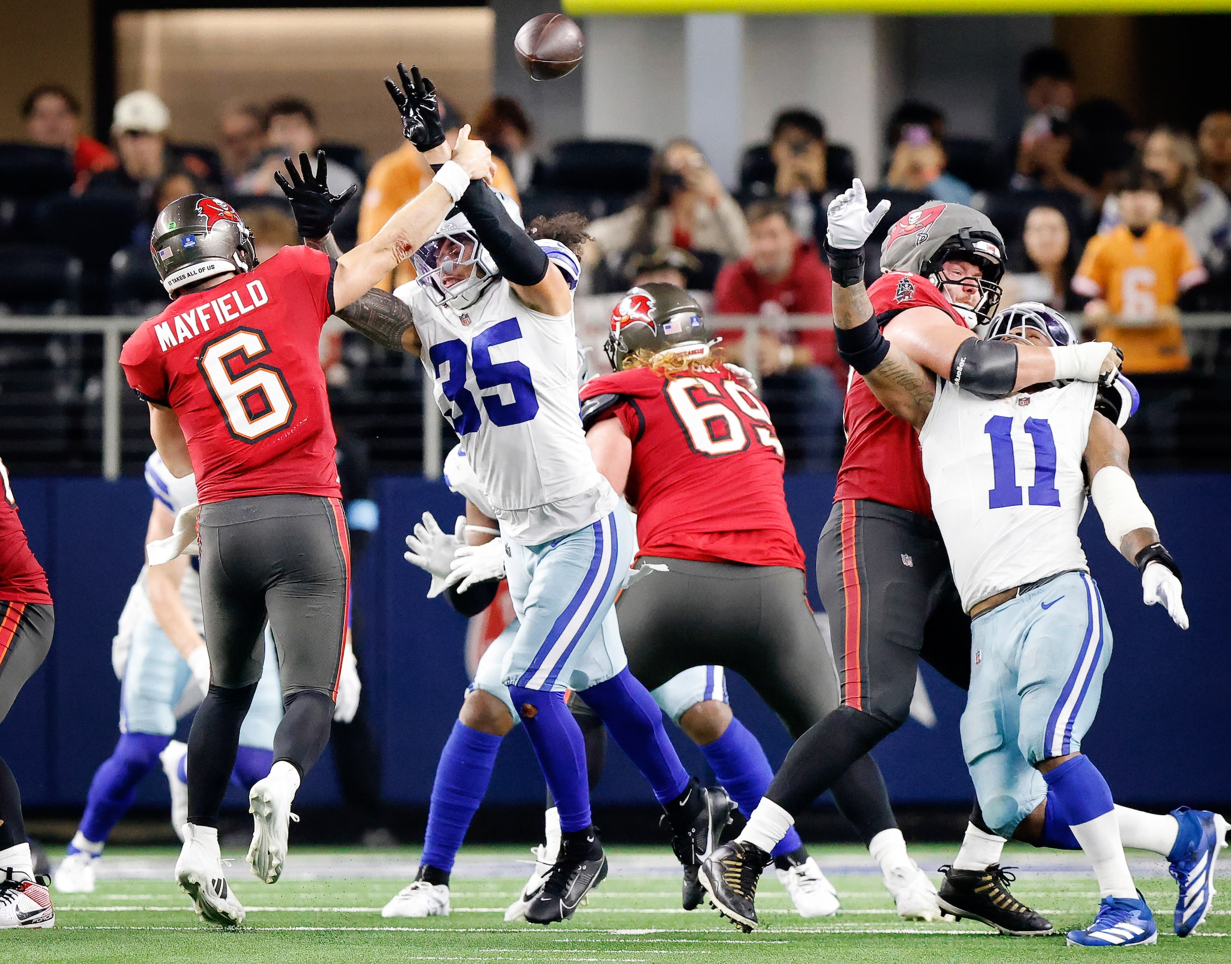 Dallas Cowboys linebacker Marist Liufau (35) forces Tampa Bay Buccaneers quarterback Baker...