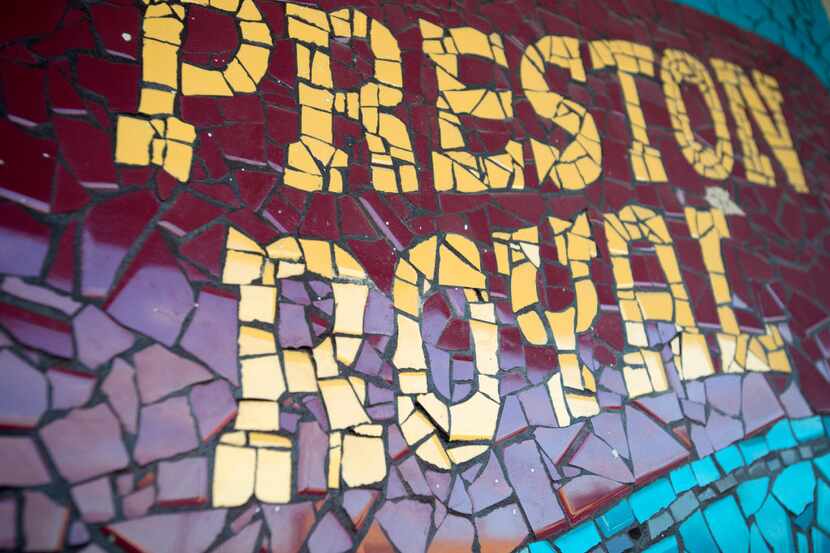 A mosaic advertising the Preston Royal shopping center tucked away on a westward-facing...