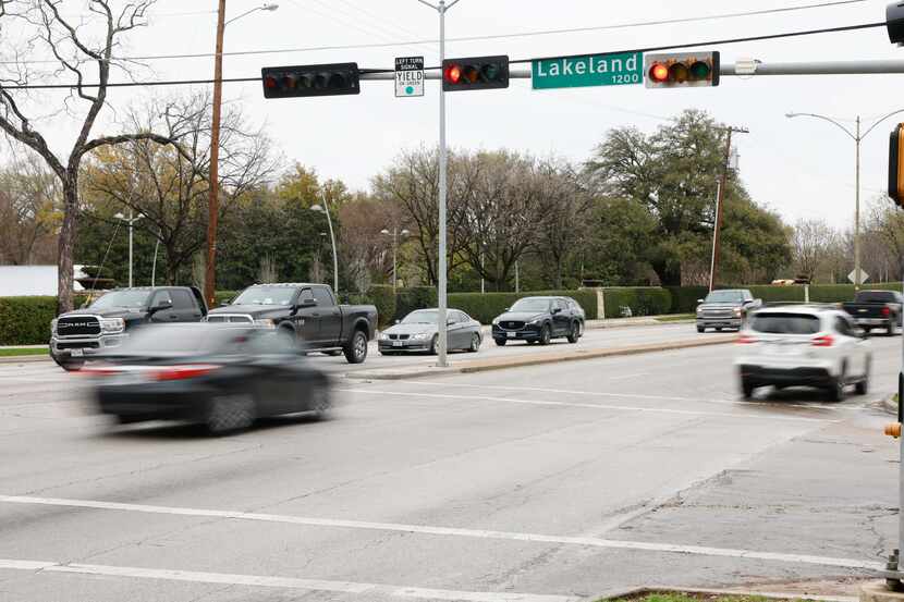 Red lights don't deter motorists Wednesday on Garland Road at the intersection adjacent to...
