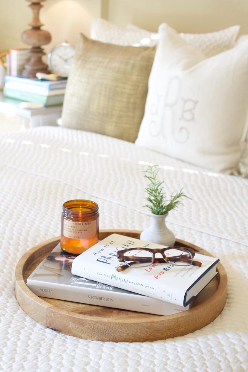 Your nightstand will thank you if you bring a tray into the bedroom. Keep reading materials,...