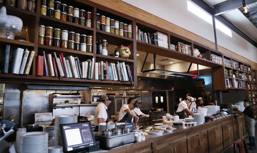 A view of the open kitchen at Underbelly in Houston.  (Kye R. Lee/The Dallas Morning News)