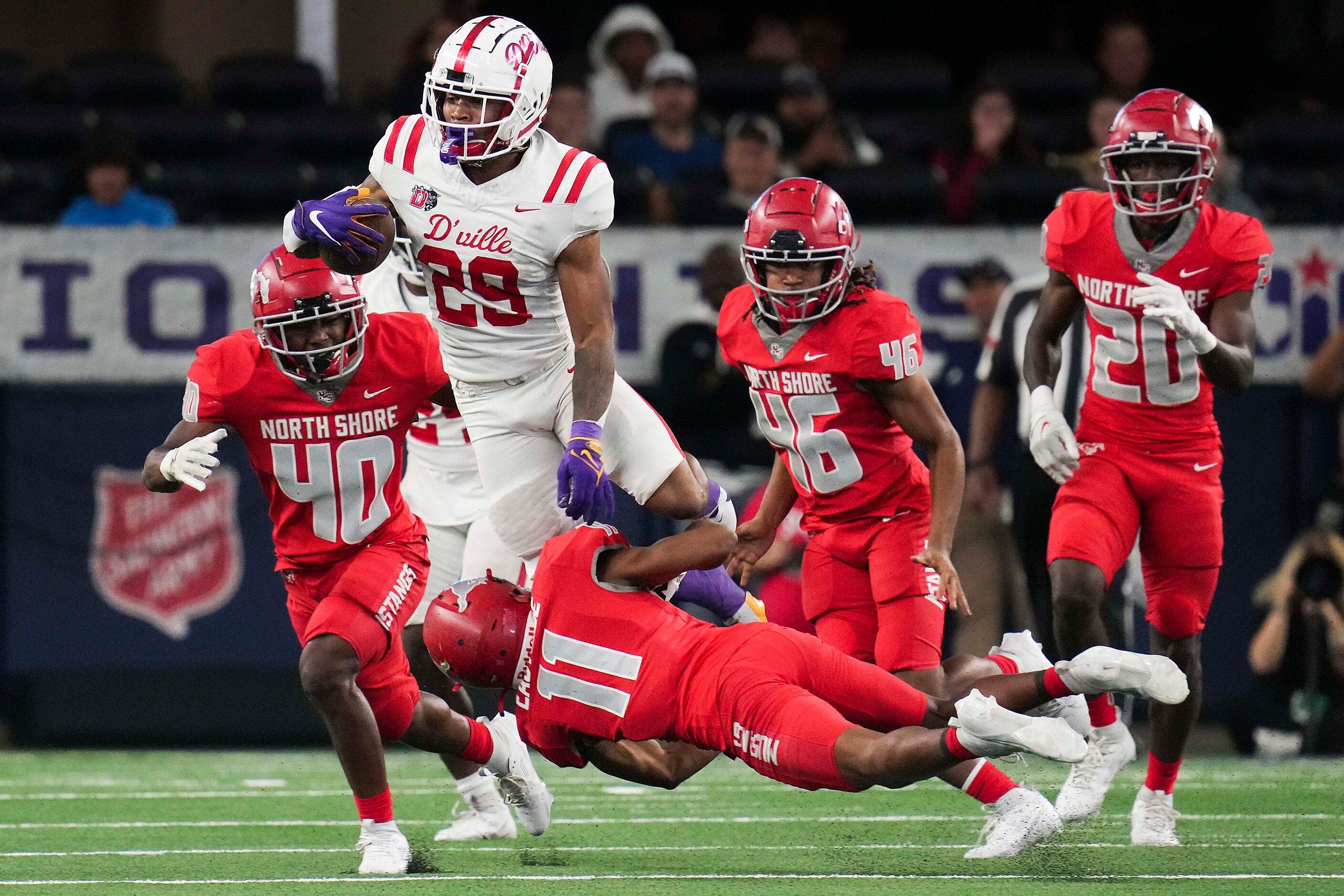 Duncanville running back Caden Durham (29) tries to hurdle Galena Park North Shore’s Jaylen...