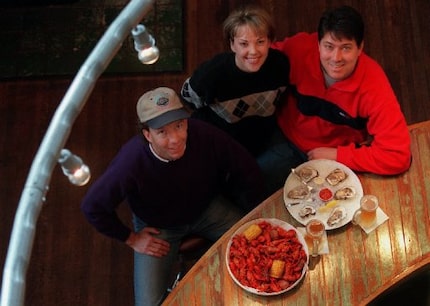 In happier times, Bill Bayne, left, Michele DeWitt and her husband Randy DeWitt, were...