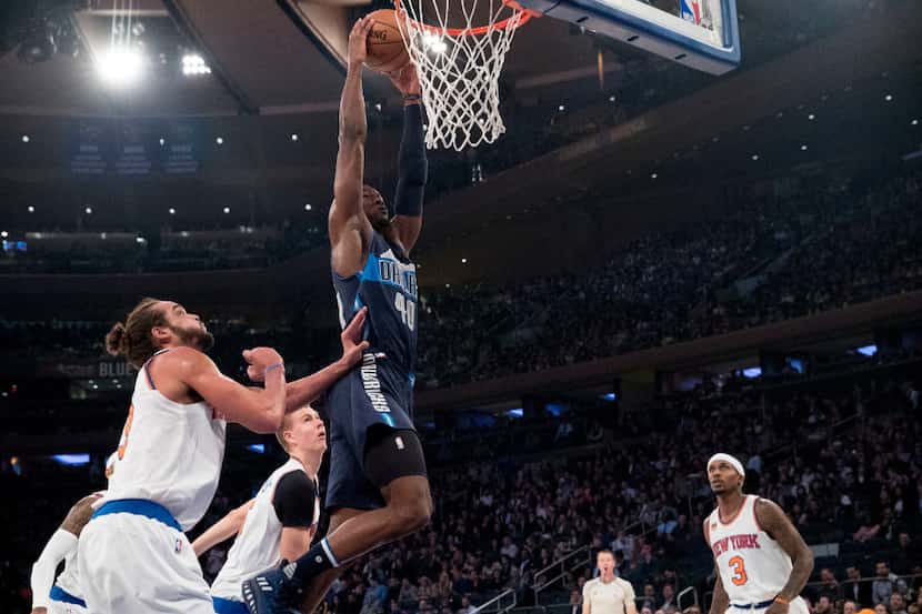 Dallas Mavericks forward Harrison Barnes (40) goes to the basket past New York Knicks center...