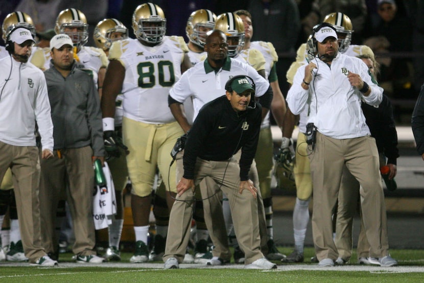 Nov 5, 2015; Manhattan, KS, USA; Baylor Bears head coach Art Briles (C) looks on from the...