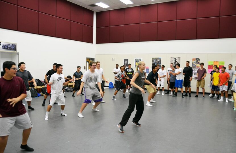 
Shannon Dunham (right) leads a group of students during a dance battle in her new class,...