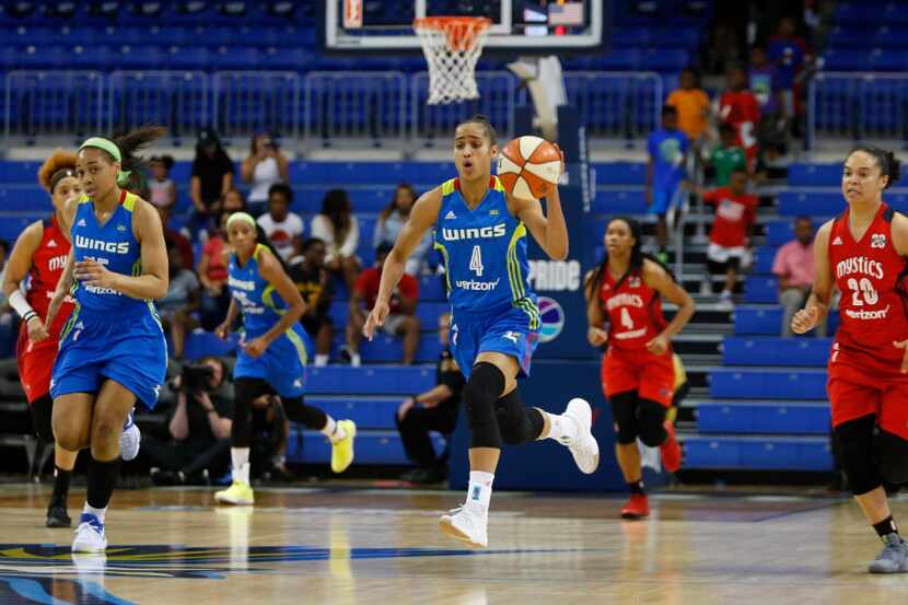 Dallas Wings guard Skylar Diggins-Smith (4) leads the offense on a fast break attempt in a...