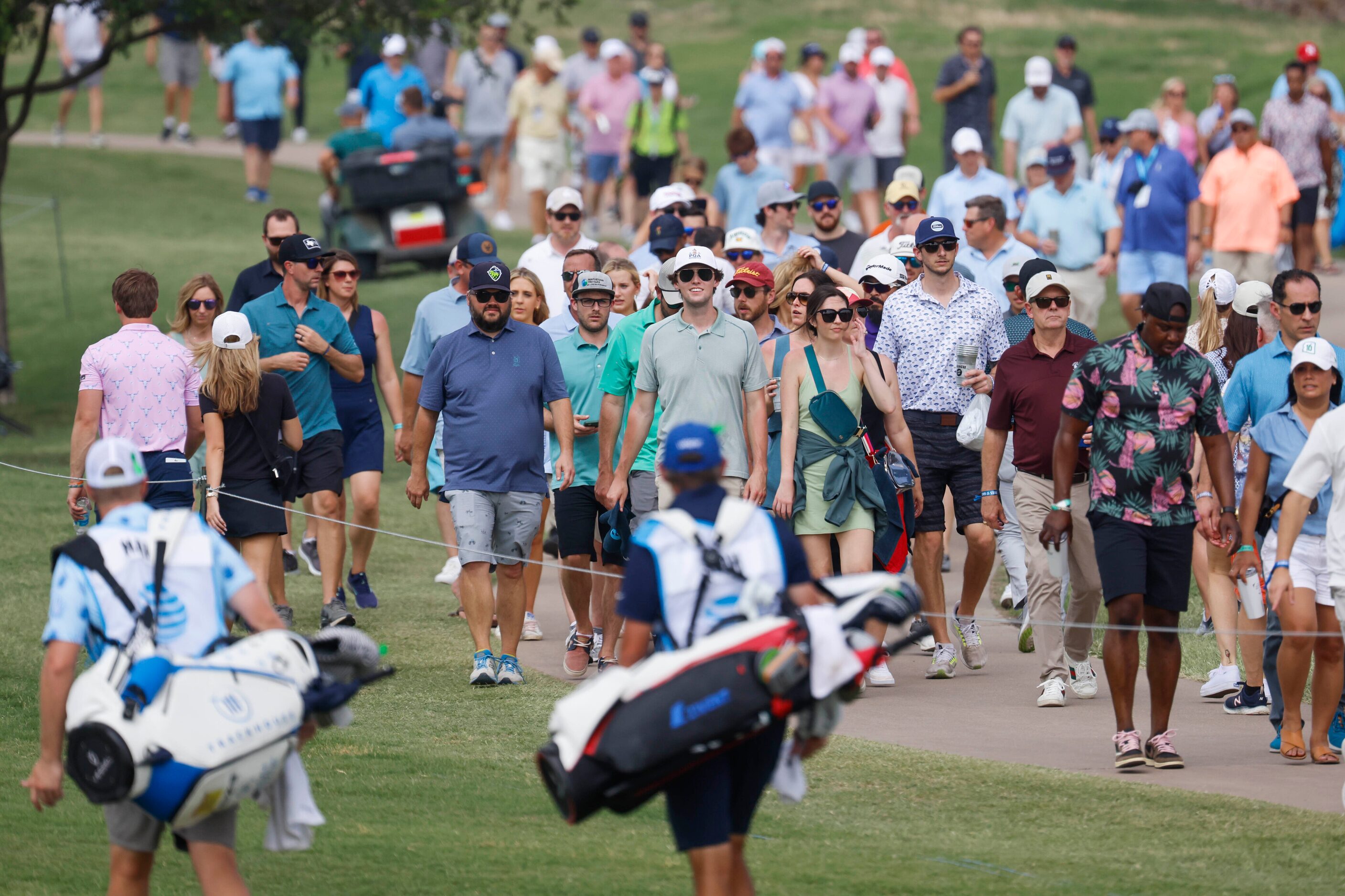 Crowd commute during the second round of the AT&T Byron Nelson at TPC Craig Ranch on Friday,...