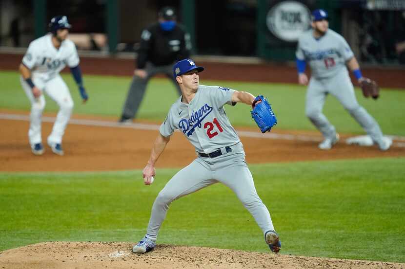 Los Angeles Dodgers starting pitcher Walker Buehler delivers during the third inning against...