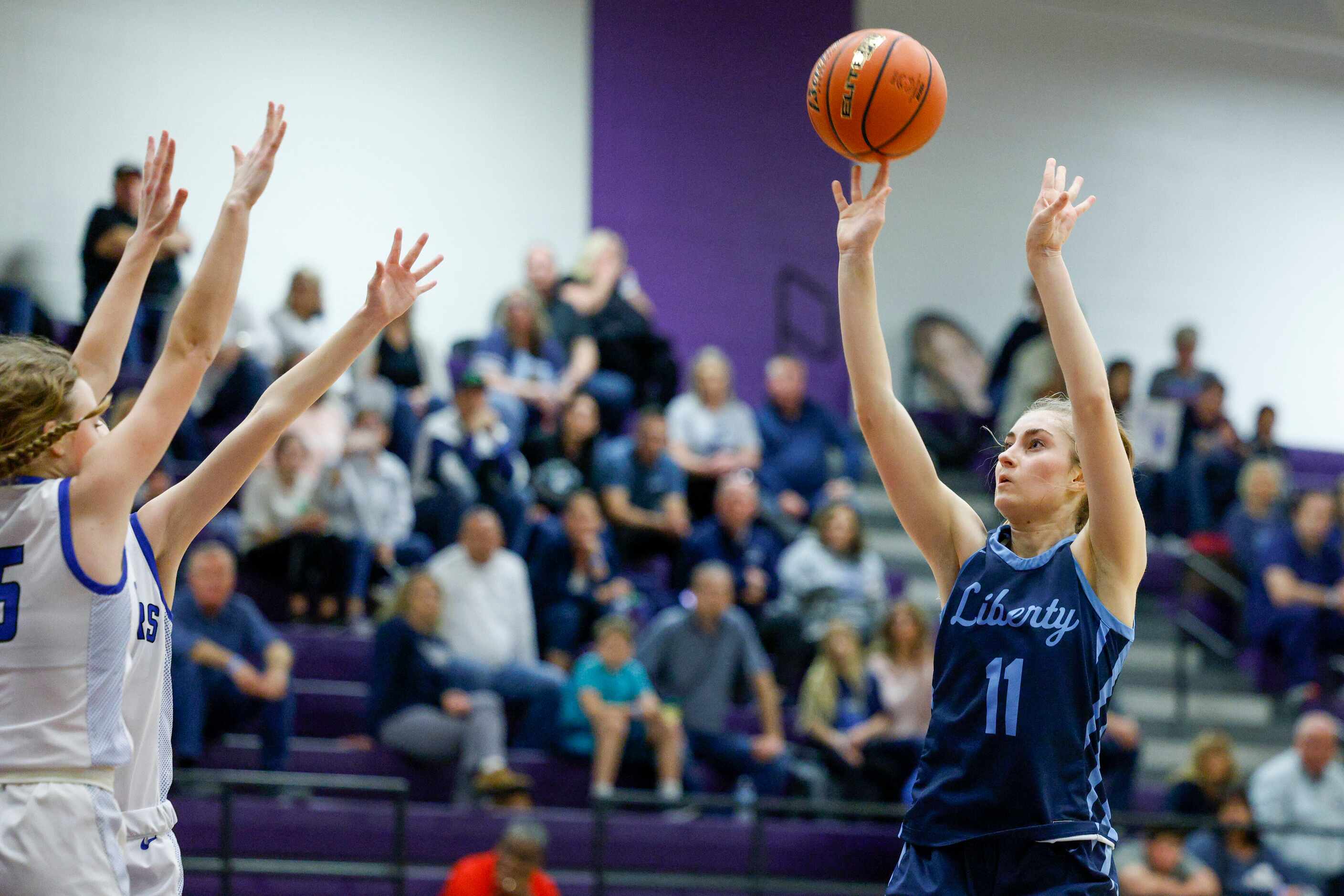 Argyle Liberty Christian guard Lauren Ullrich (11) shoots the ball during the first half of...