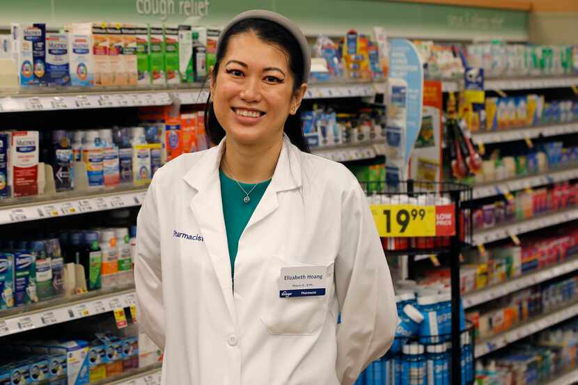 Elizabeth Hoang is a pharmacist at the Kroger Pharmacy in Flower Mound on Saturday, July 8,...