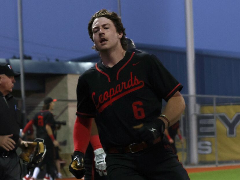 Lovejoy's Asher Lacy (6) scores during the bottom of the 3rd inning of play against Frisco....