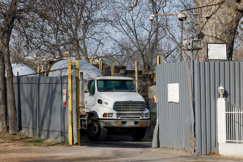 A concrete mixer sits parked at Latino's Ready Mix Concrete in Dallas, Thursday, Dec. 23, 2021.