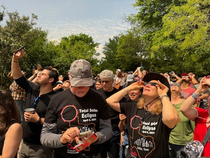 Scenes from the Dallas Zoo during Monday's eclipse in Dallas.