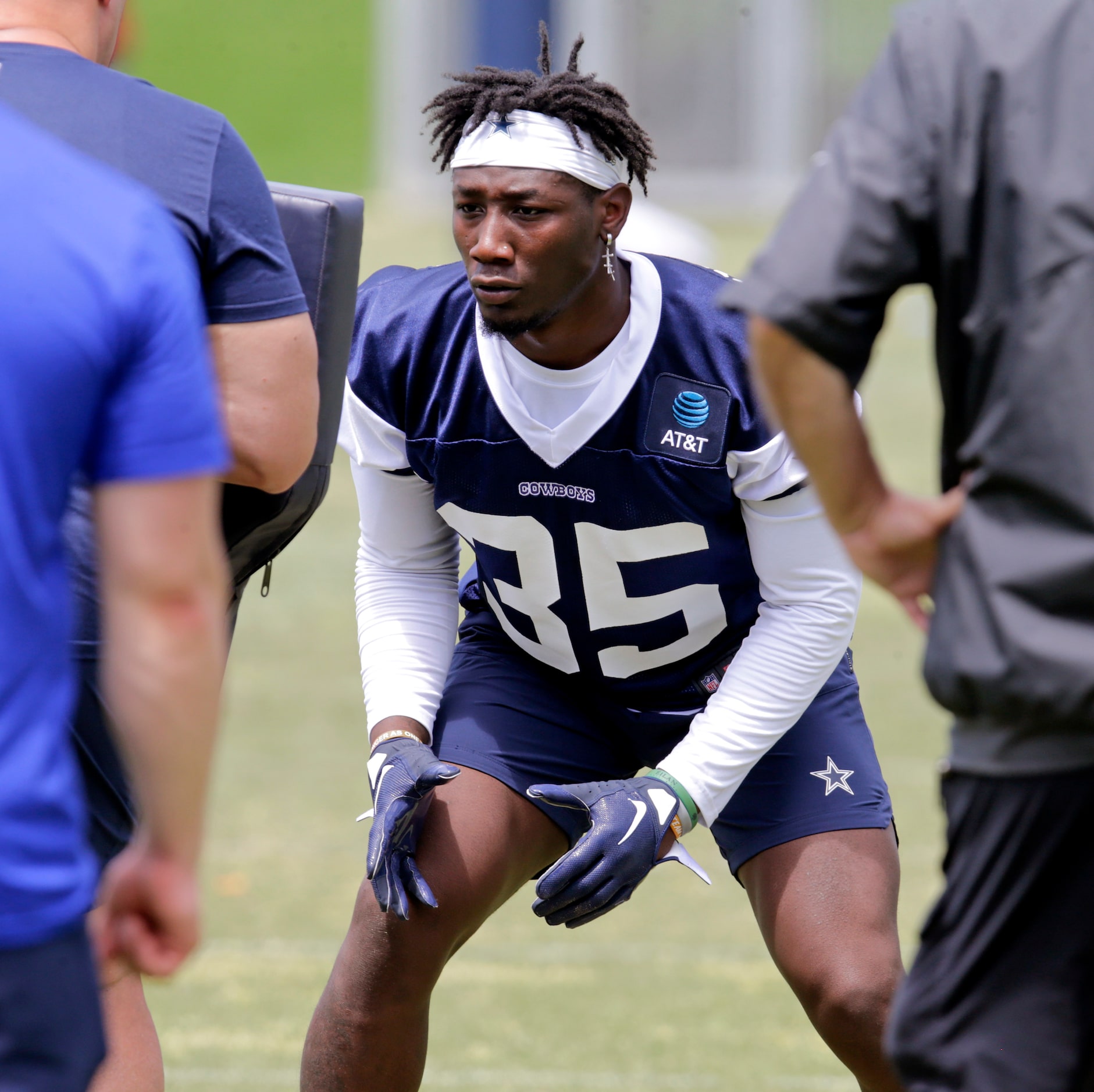 Cowboys rookie linebacker DeMarvion Overshown (35) takes part in a drill as the Dallas...