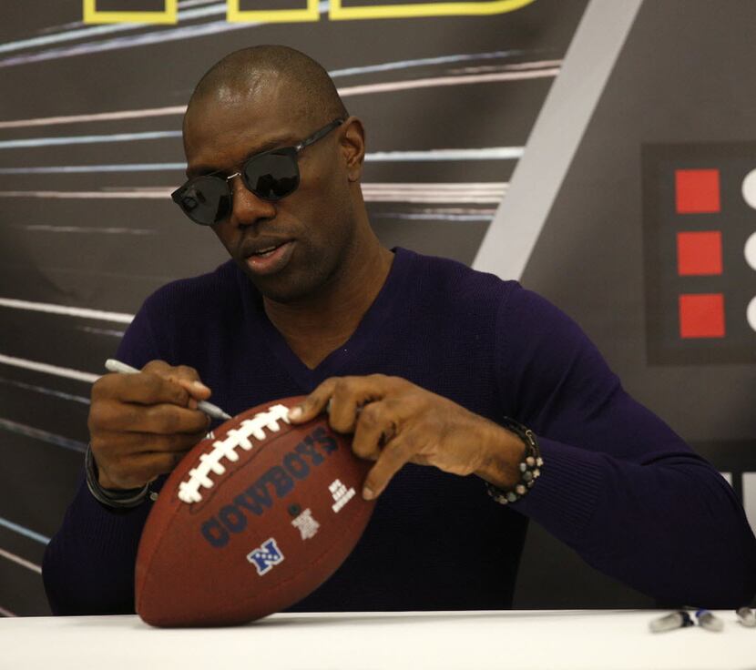 Terrell Owens signed a fan's football during a 2016 event at the Irving Convention Center.