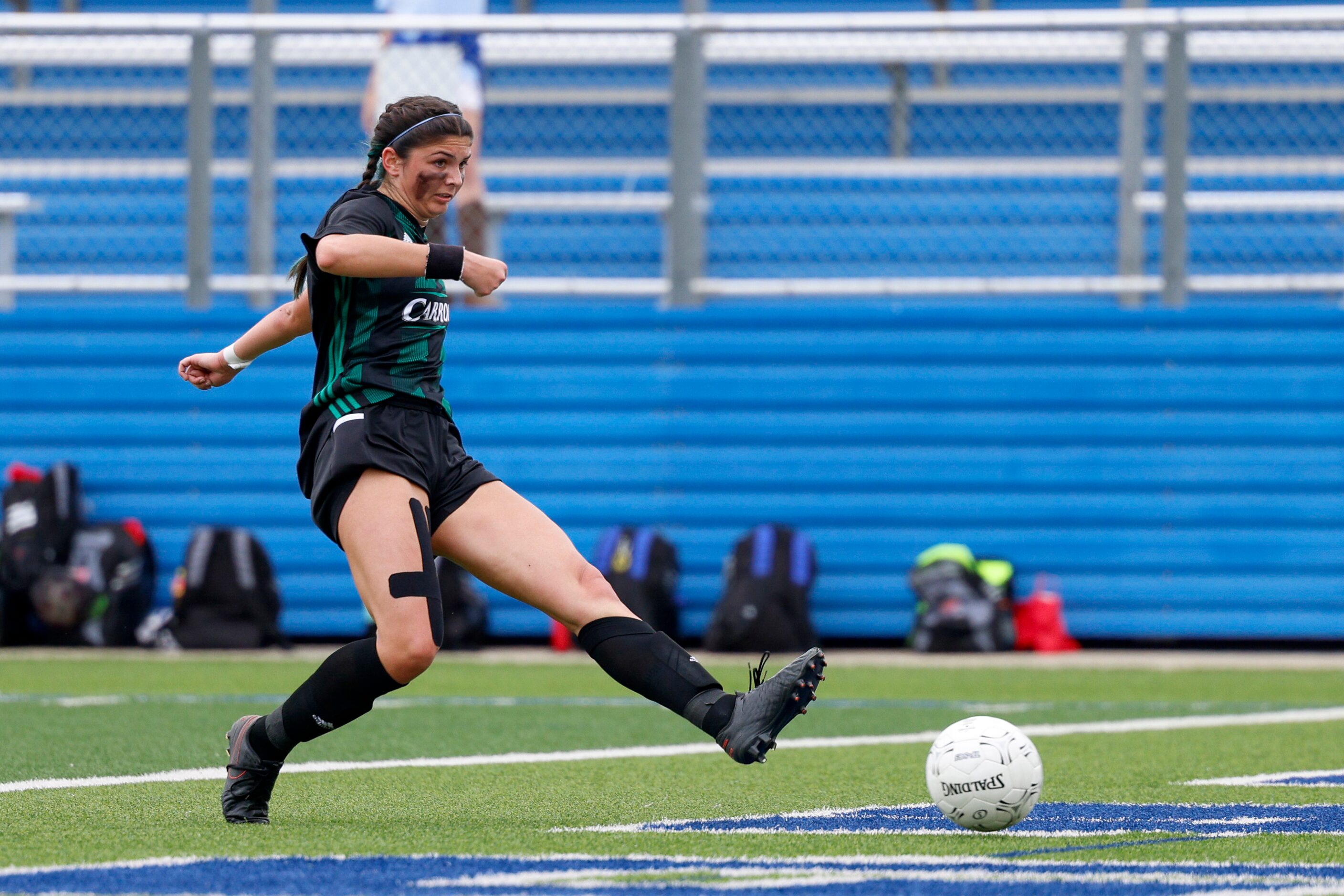 Southlake Carroll forward Hanna Khan (8) scores a goal during the first half of a Class 6A...