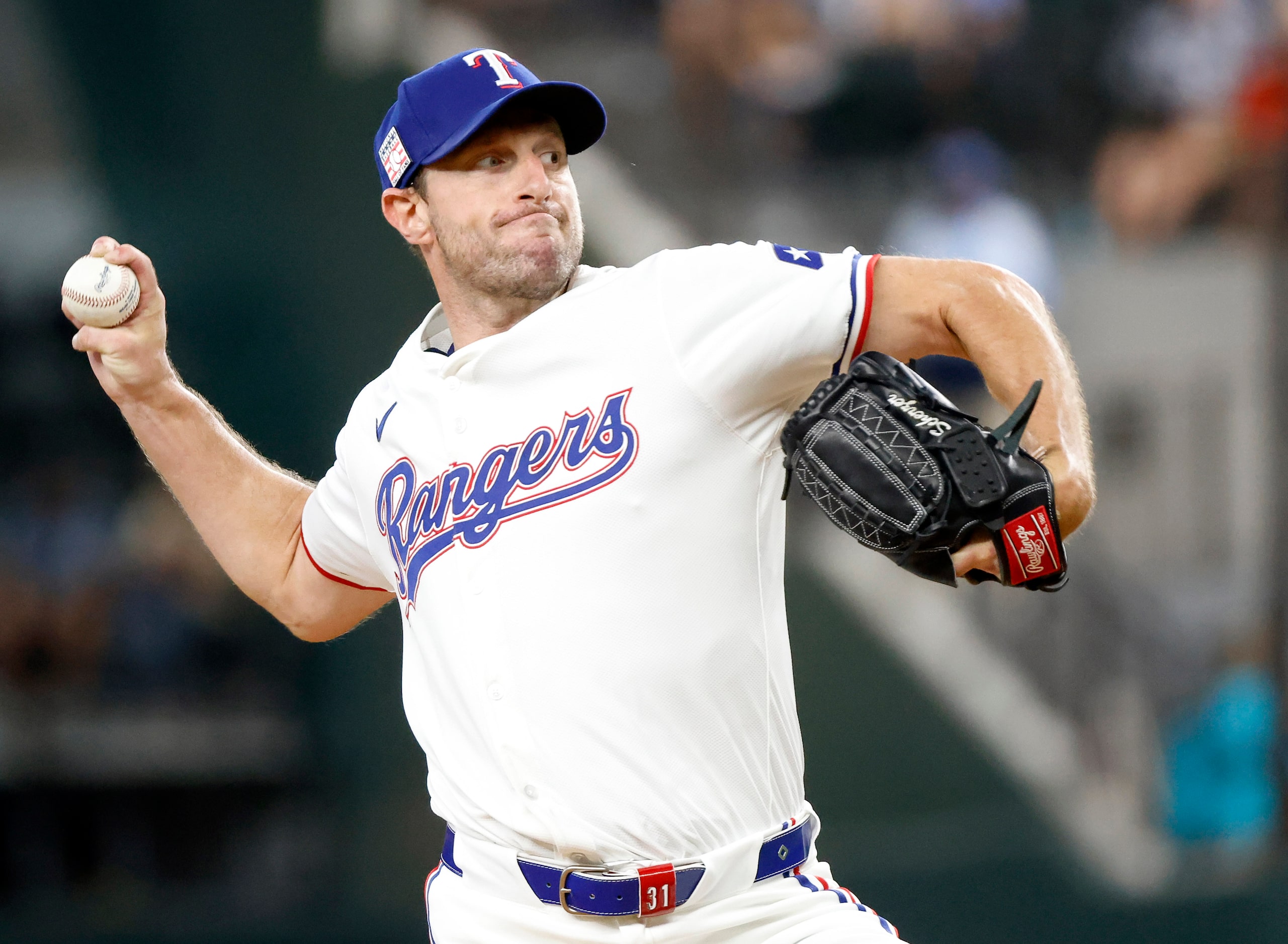 Texas Rangers starting pitcher Max Scherzer throws in the fist inning against the Baltimore...