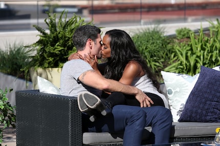 Rachel Lindsay and Peter Kraus lock lips on a bench in his hometown, Madison, Wisconsin. So...