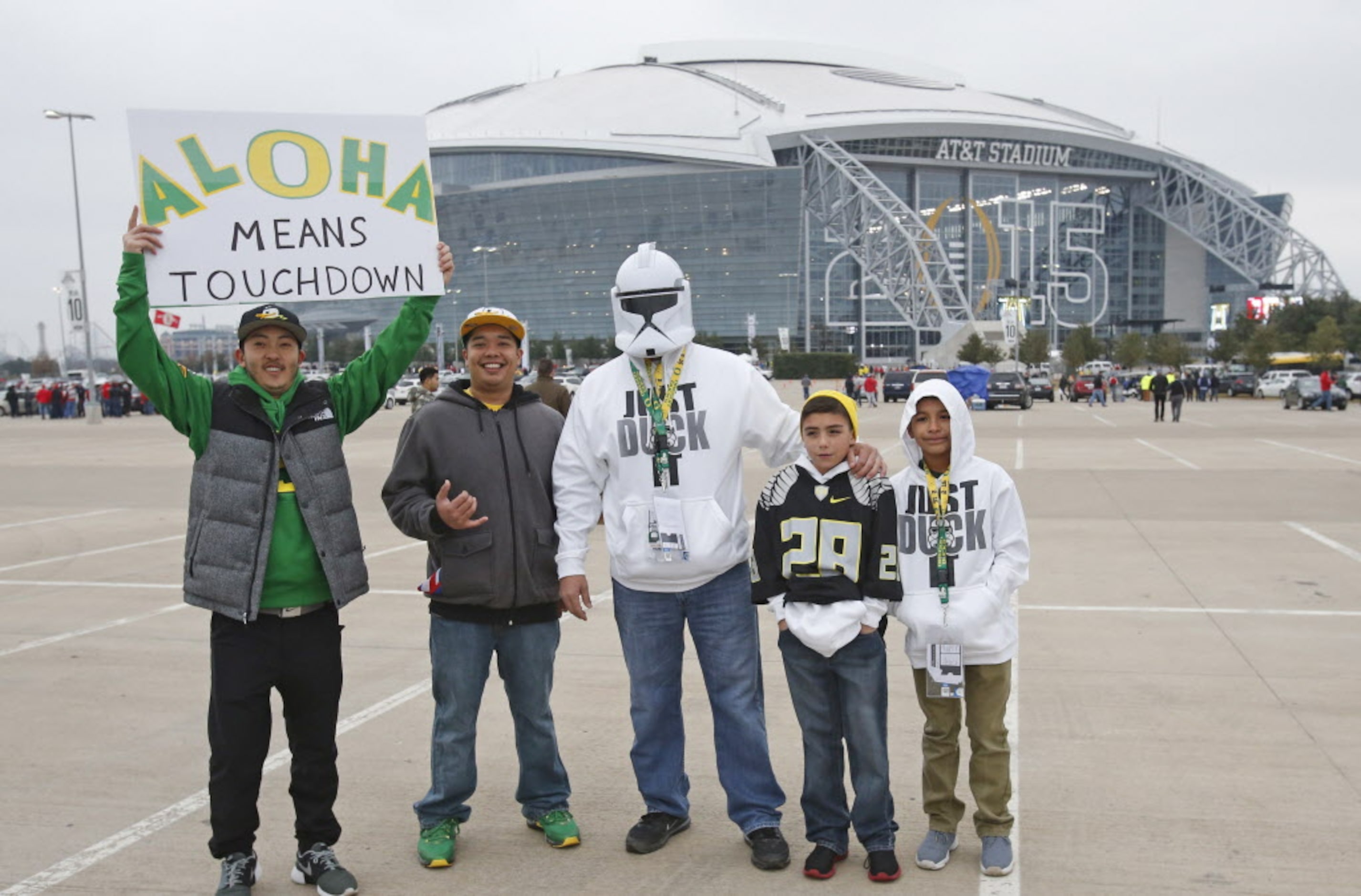 A group of Oregon fans from Hawaii poses for a photo before the College Football National...