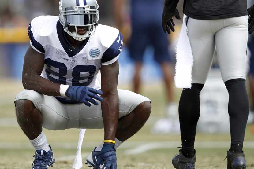 Dallas Cowboys wide receiver Dez Bryant (88) is slow to get up after a play during the...