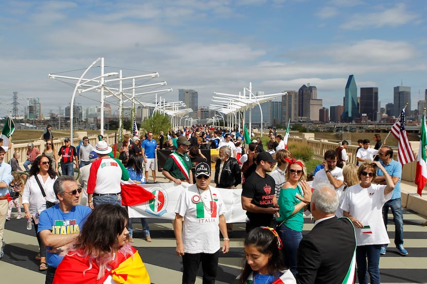 Participants lined up on the Continental Avenue bridge at the start of the Columbus Day parade.