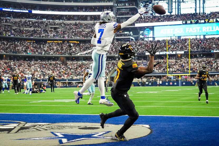 Dallas Cowboys cornerback Trevon Diggs (7) breaks up a pass intended for Washington...