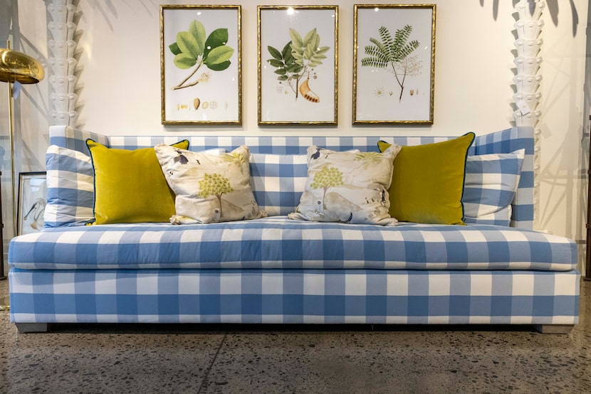 This blue-and-white checked sofa is for sale for $13,500 at Coco & Dash in Dallas and has...