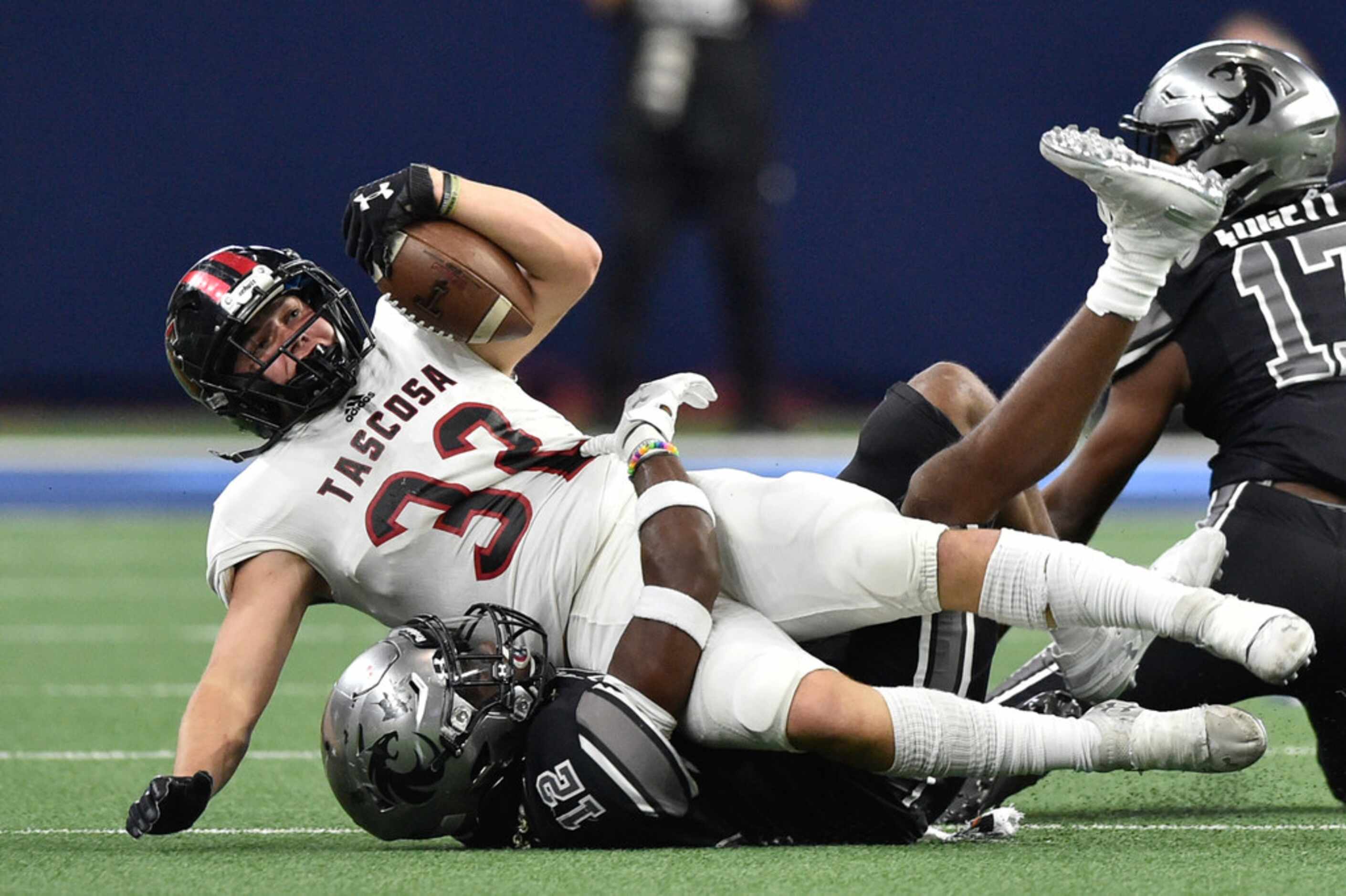 Denton Guyer vs. Amarillo Tascosa.
Guyer defensive back Deuce Harmon (12) tackles Tascosa's...