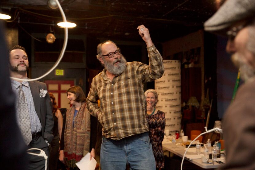 Ochre House founder and artistic director, Matthew Posey, center, directs in a rehearsal of...