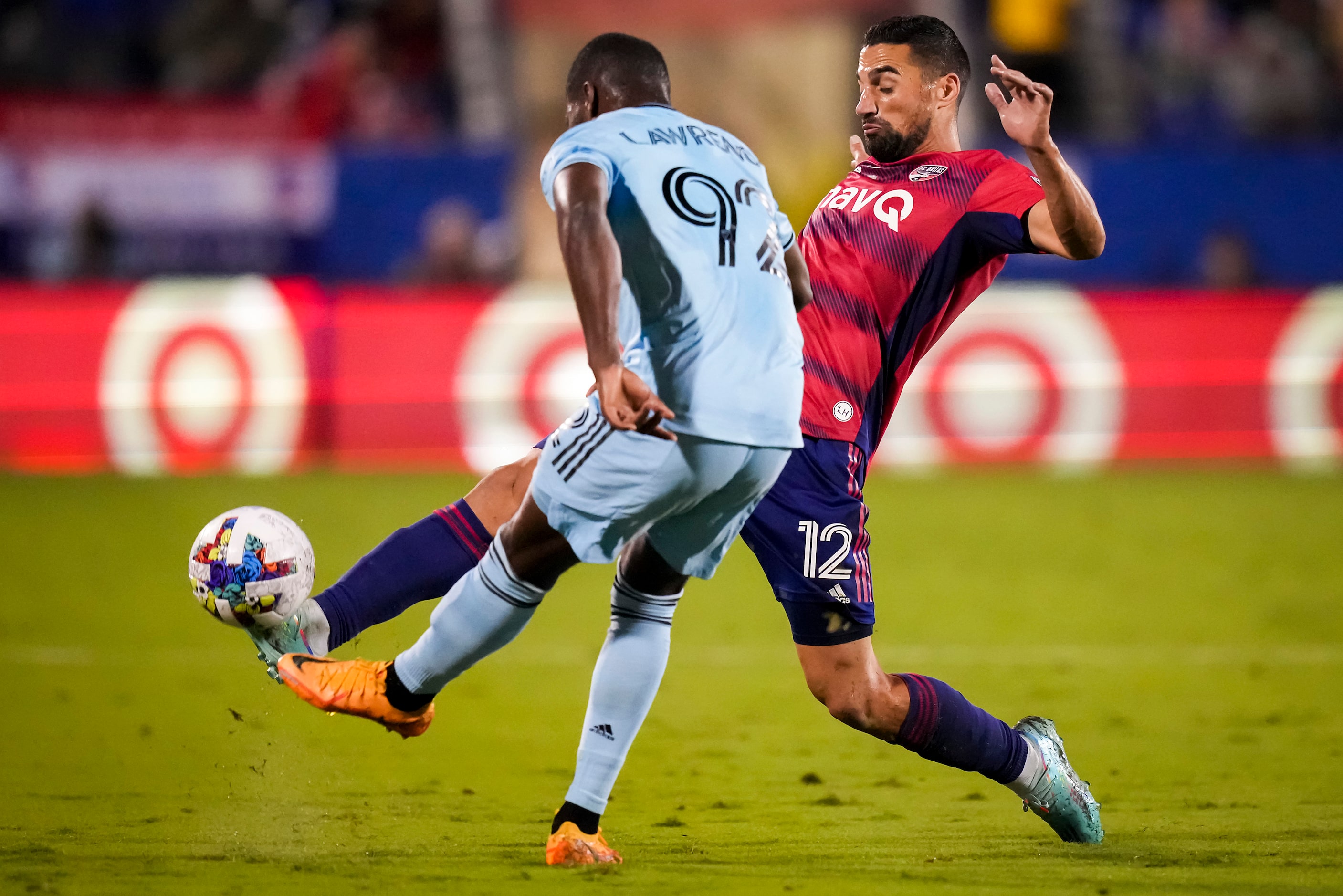 FC Dallas midfielder Sebastian Lletget (12) challenges Minnesota United defender Kemar...