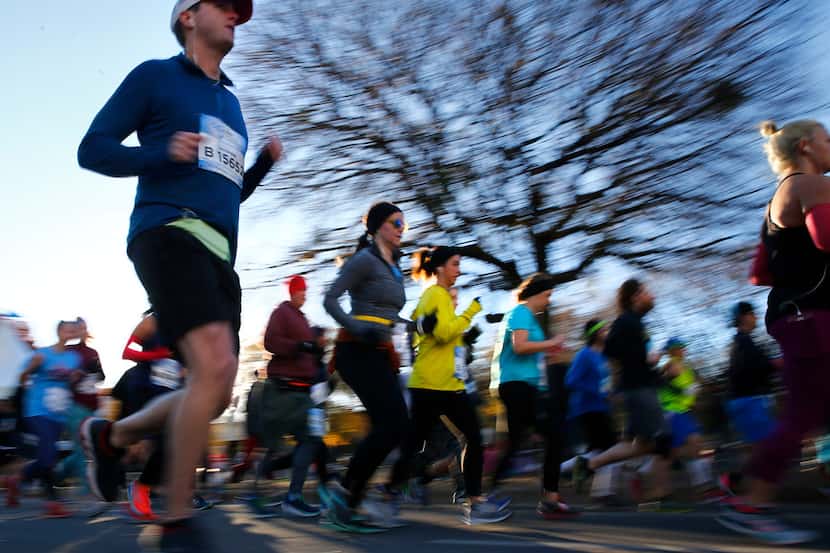 FILE - People start the BMW Dallas Marathon in downtown Dallas on Dec. 10, 2017.  (Nathan...