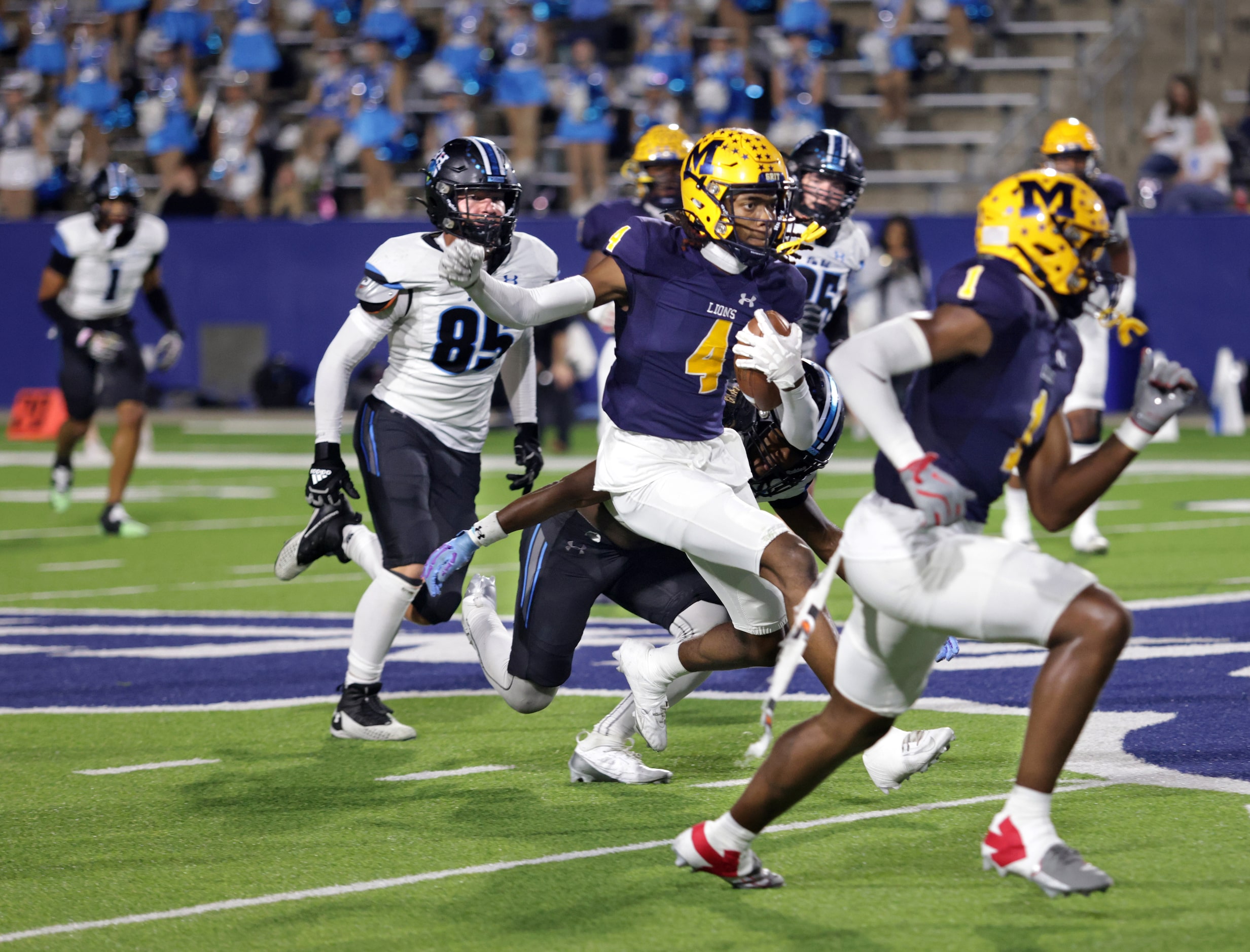 McKinney player #4 Ja'bree Bickham runs the ball during the Prosper Rock Hill High School...