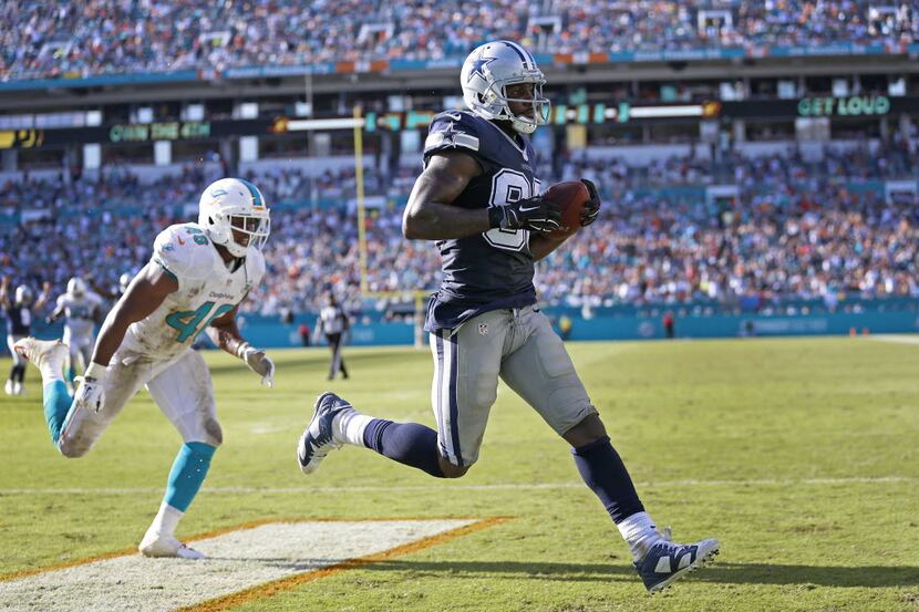 Dallas Cowboys wide receiver Dez Bryant (88) catches a touchdown pass over Miami Dolphins...