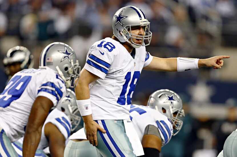 Dallas Cowboys quarterback Kyle Orton calls a play during the first half of a 24-22 loss to...