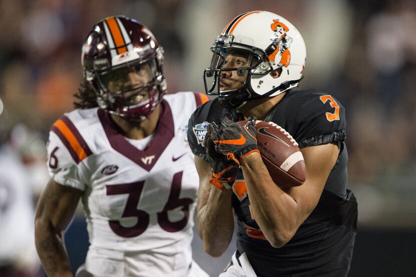 ORLANDO, FL - DECEMBER 28: Wide receiver Marcell Ateman #3 of the Oklahoma State Cowboys...