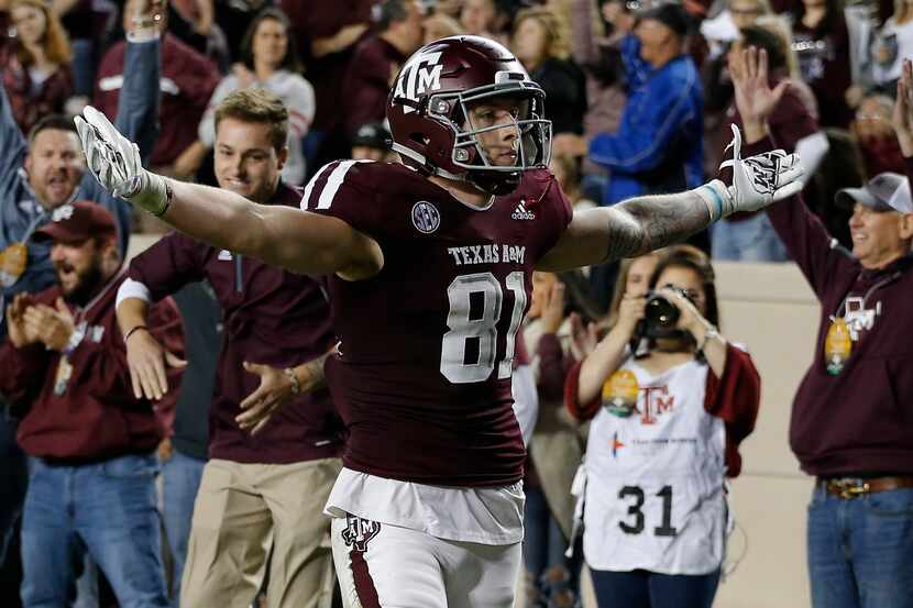 COLLEGE STATION, TEXAS - NOVEMBER 24: Jace Sternberger #81 of the Texas A&M Aggies scores on...