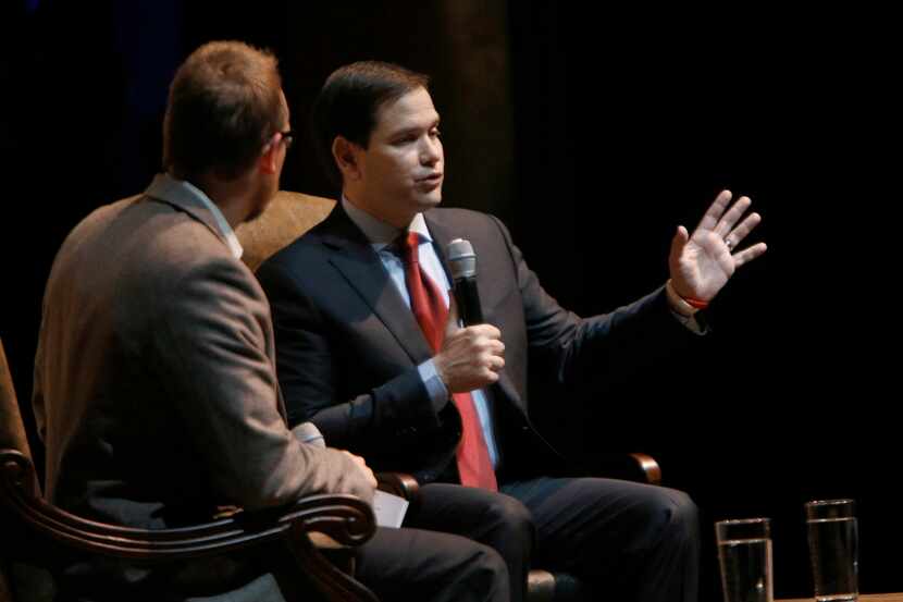 Yellowhammer News CEO Cliff Sims listens as GOP presidential candidate Marco Rubio answers a...