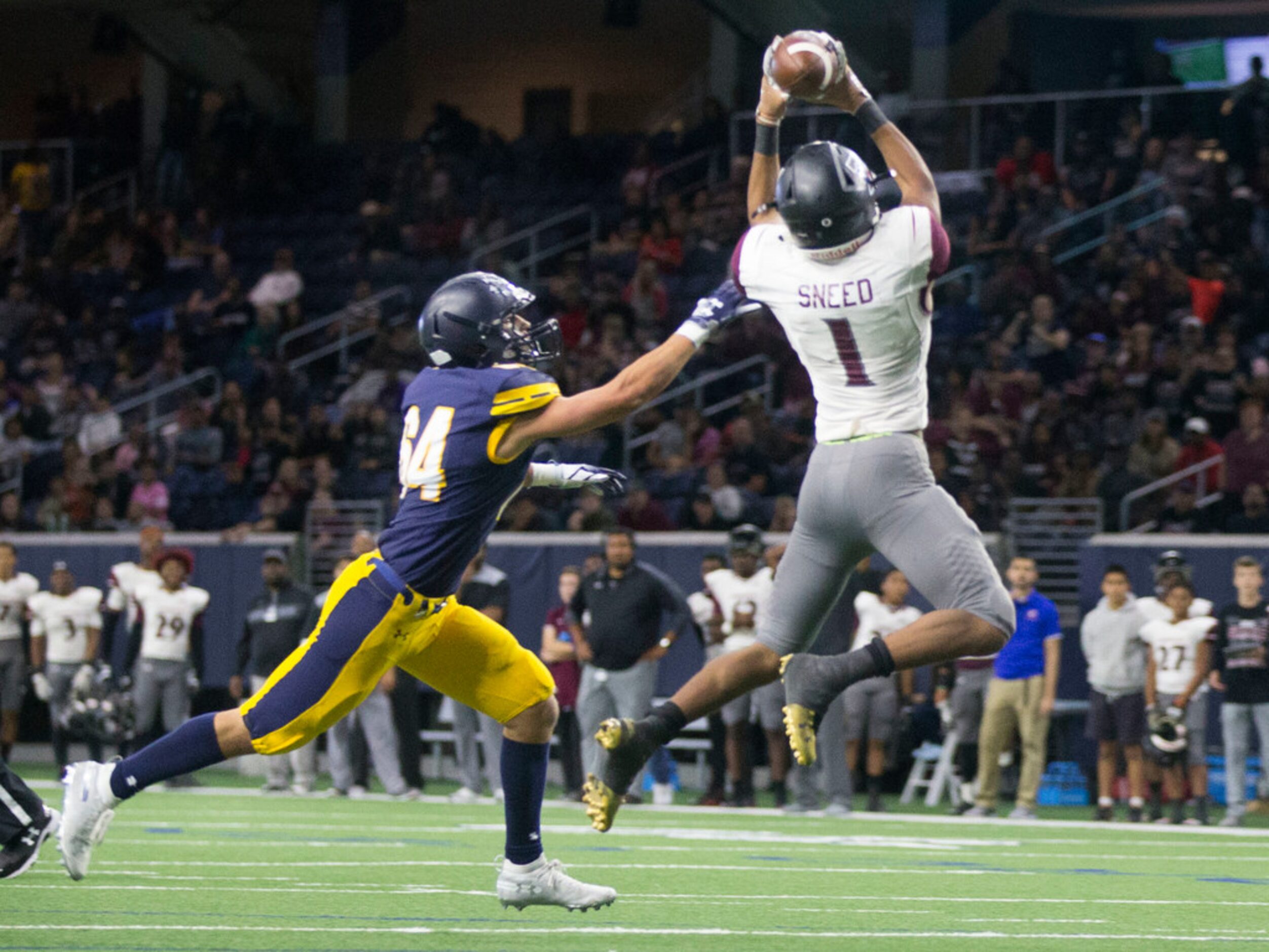 Timberview running back Stacy Sneed (4) leaps for the ball during a high school football...