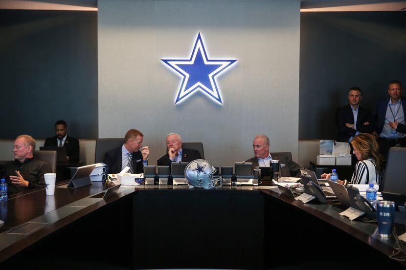 Dallas Cowboys Head Coach Jason Garrett, left, Owner Jerry Jones, and Chief Operating...