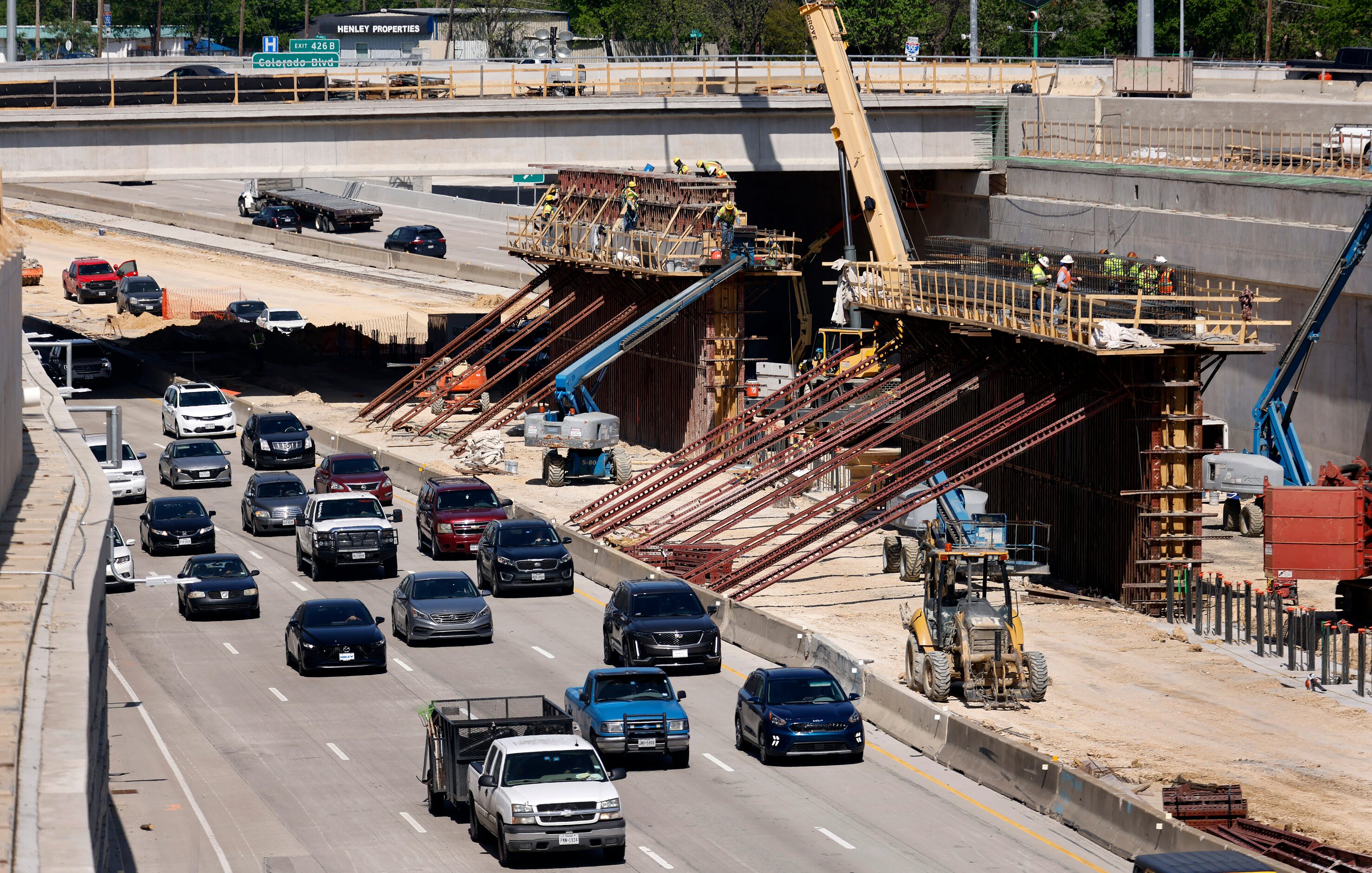 Crews construct support structures for the $172 million Southern Gateway Park on Interstate...