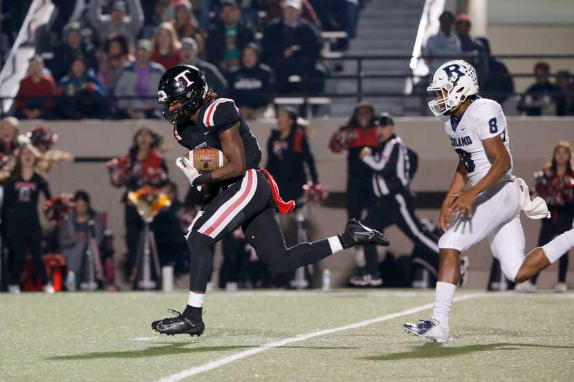 Euless Trinity receiver Jacob Schaeffer (13) catches a long pass as Richland's Da'lon Arthur...