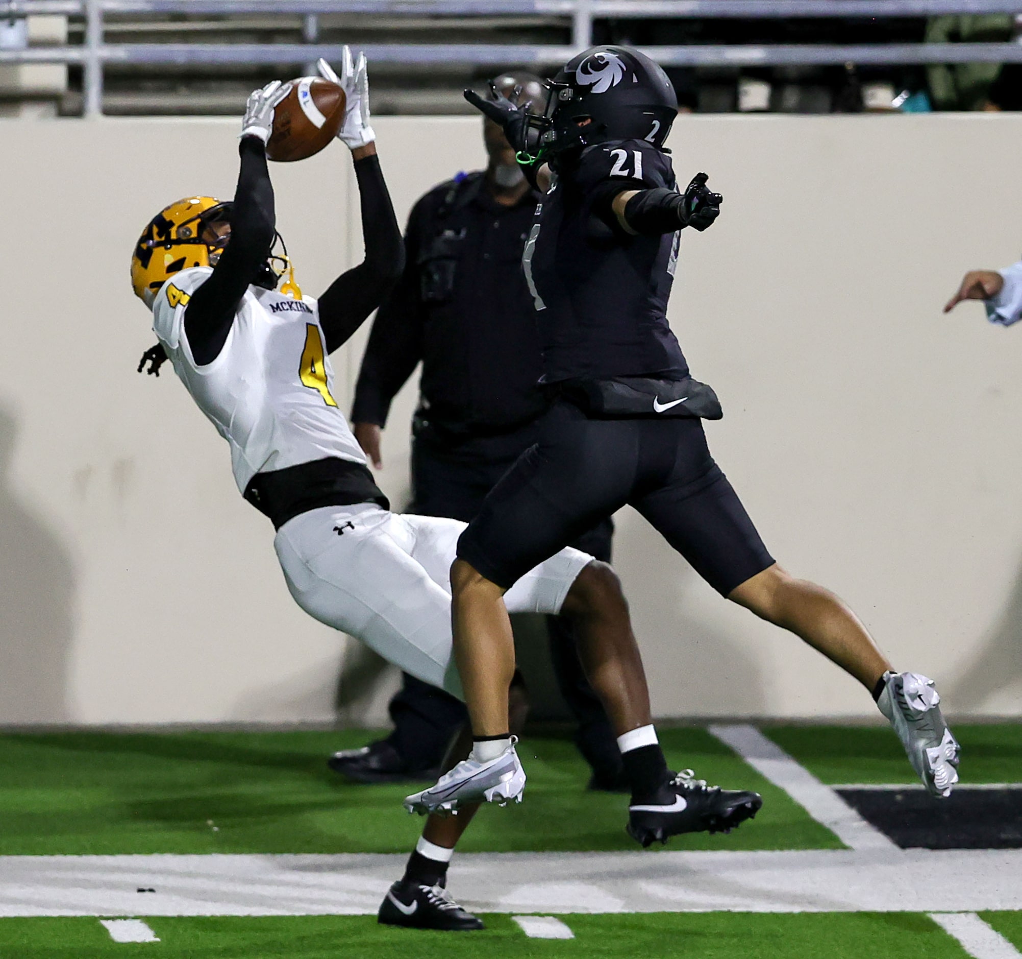 McKinney wide receiver Ja'bree Bickham (4) tries to come up with a reception against Denton...