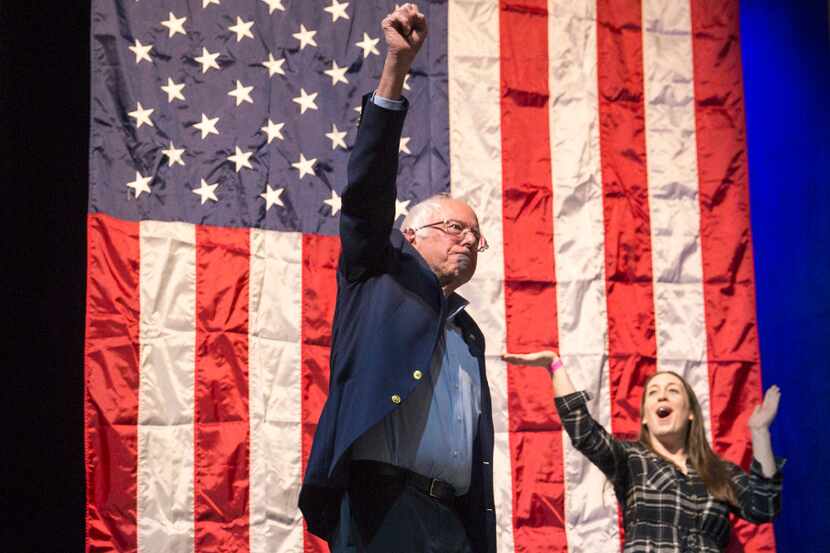 In this April 17, 2017 photo former presidential candidate Bernie Sanders greets the crowd...